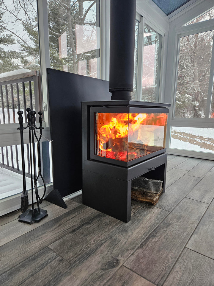 A Beautiful Blazing fire in the KFD Ariana- Photo sent in by Ben in Wisconsib he used the KFD Ariana to heat his sun room in Wisconsin. Multi Sided See through Direct Vent or Wood Burning Fireplace
