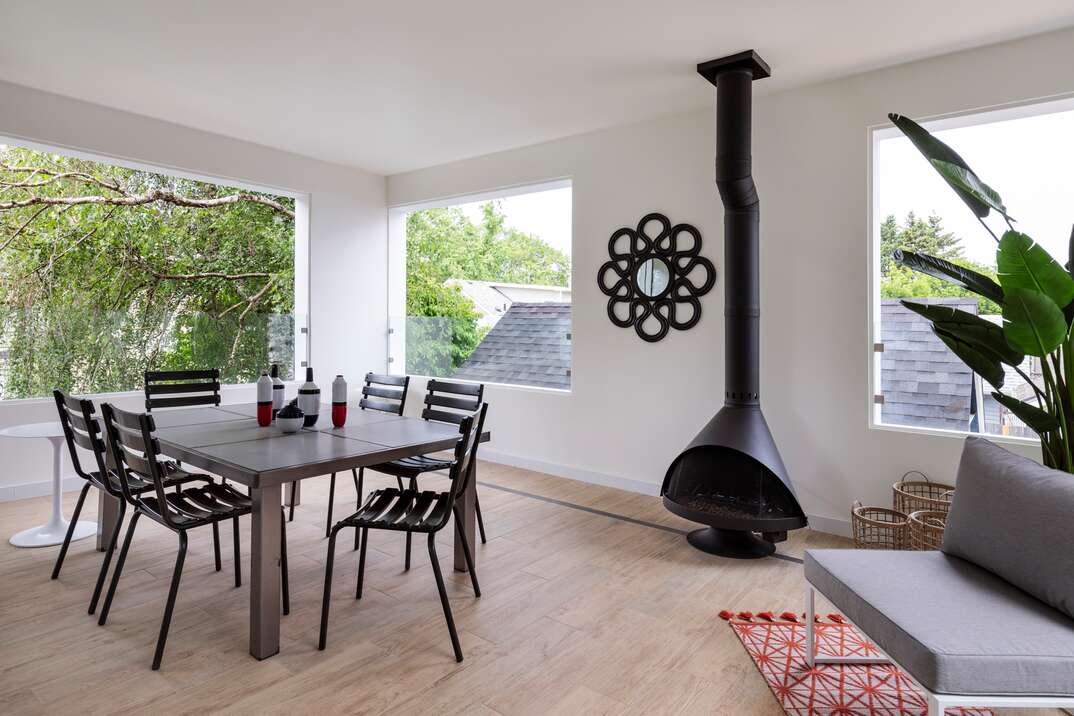 This is the Matte Black Malm Zircon 34" wood Burnng Cone Fireplace. See the 2 45s in the flue pipe are so they could use an existing flue box by duravent that was already installed in the home before they renovated the place to add this firepalce by Smokey Mountain Firepalces. this is one of the pre ordered Malm Zircon MCM that we will have in stock from time to time