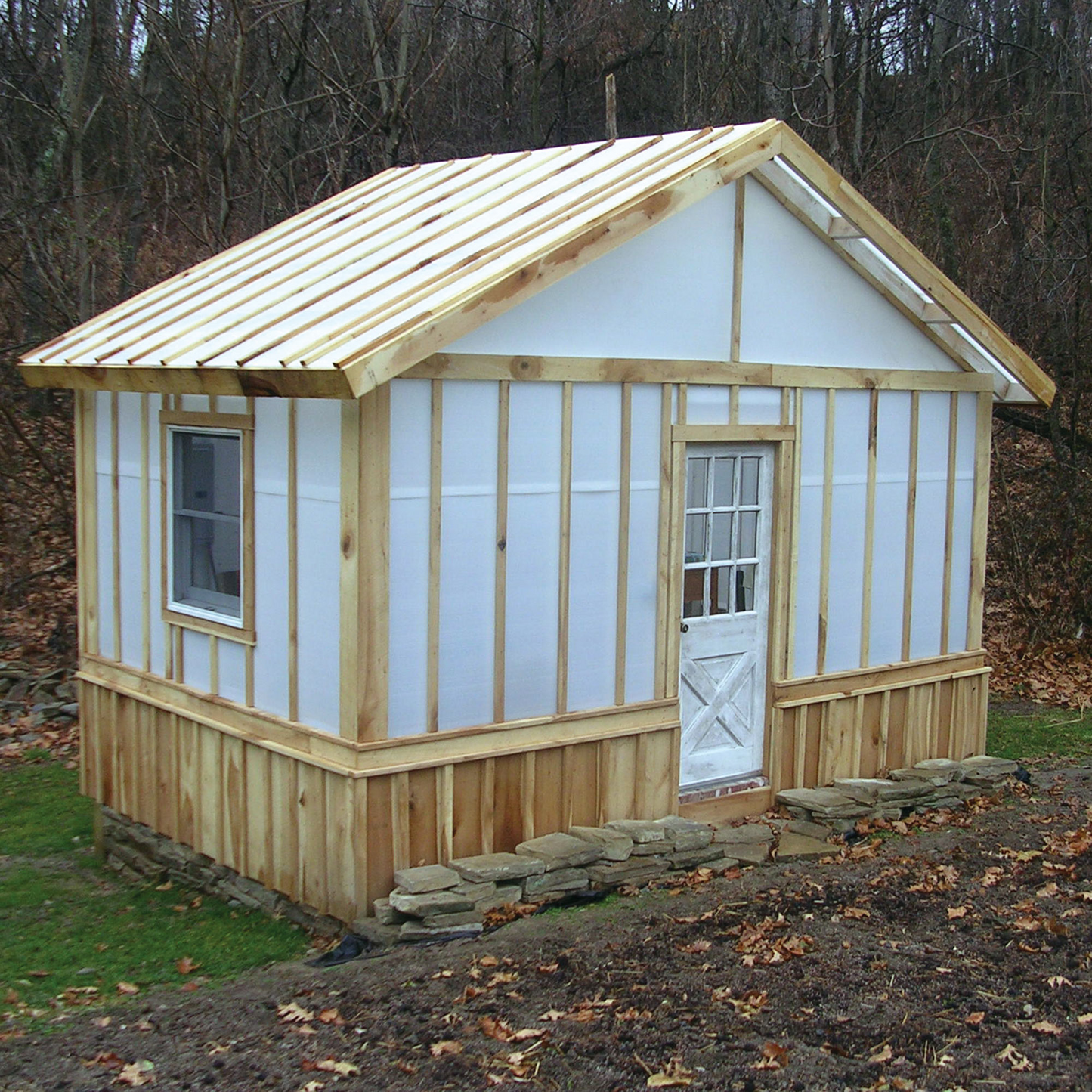 A house covered with solexx greenhouse panel roll