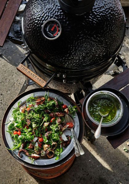 Outdoor cooking using 54" height BSTRD urban large solo Kamado Grill