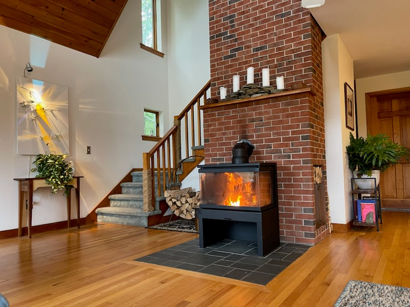 3 sided open Ga fireplace with damper and flame control knobs. This is an almost all glass wood fireplace, with a steel back plate to allow you to get closer to wall (24" clearance) Fireplace
