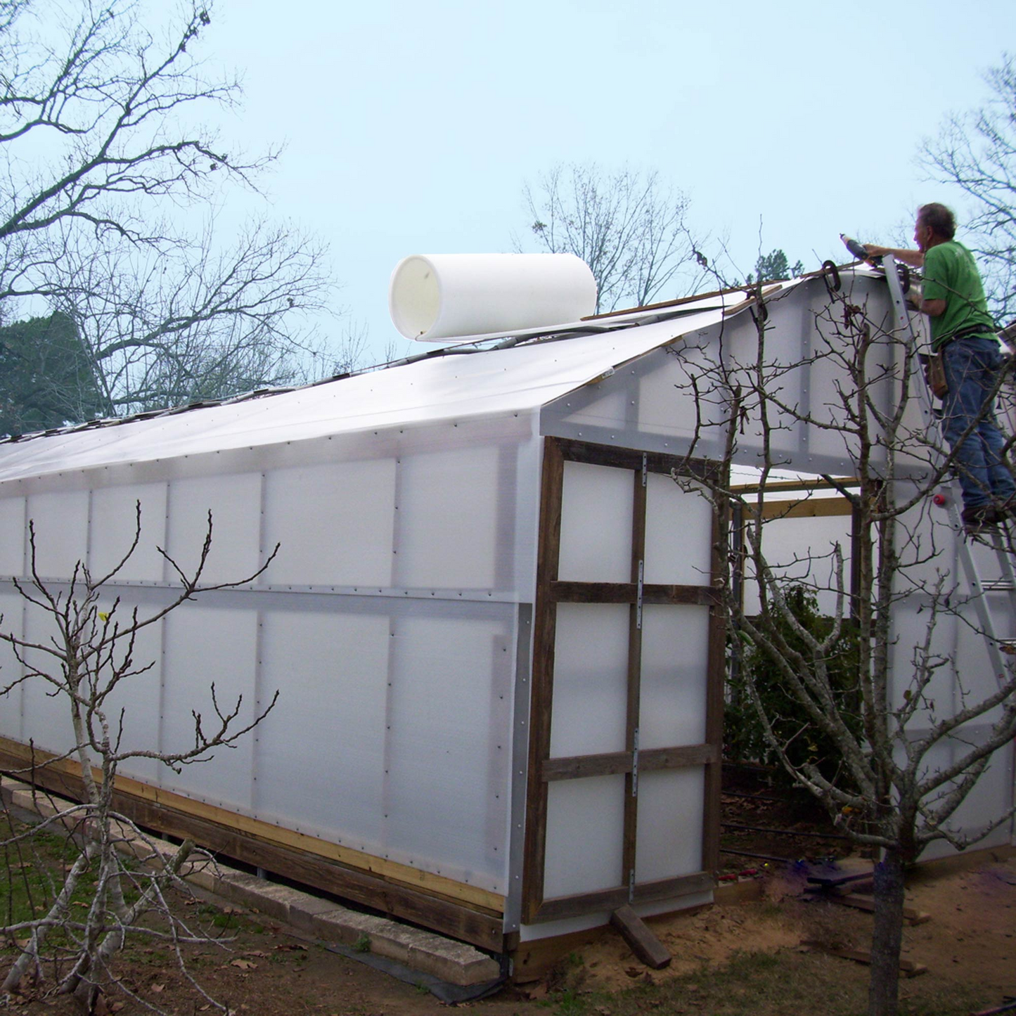 A house covered with solexx greenhouse panel roll