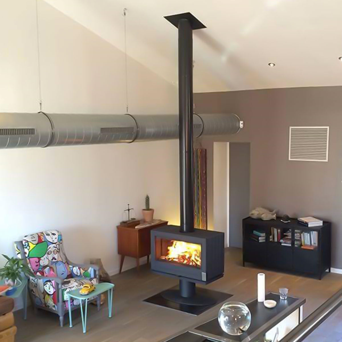 Modern Office Space Heating Wood Stove Stove Bench This black sandblasted steel bench is both modern and practical. It has 4 levelers. Available in two sizes (39 Inches, 63 Inches) , it allows you to install your Preston, Aaron or Réva stove