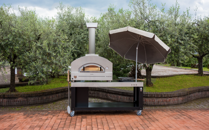 Outdoor Kitchen setup with the Proper Style and the best quality pizza oven on the market. This Hybrid Pizza oven is THE ONE. 