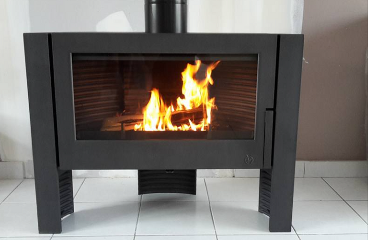 real Wood Fire clean burning wood stove - Base stand allows to hold wood under as well as a sturdy 3 sided pedestal with the large glass viewing area