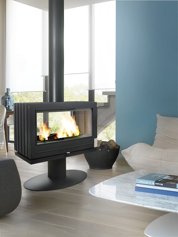 Center room fireplace with see through glass and a pedestal (included) this is a great value wood stove with dual glass and a pedestal. if you want it by itself check out the french made Aaron that can be sat on an existing bench or add whatever stand you feel is right.