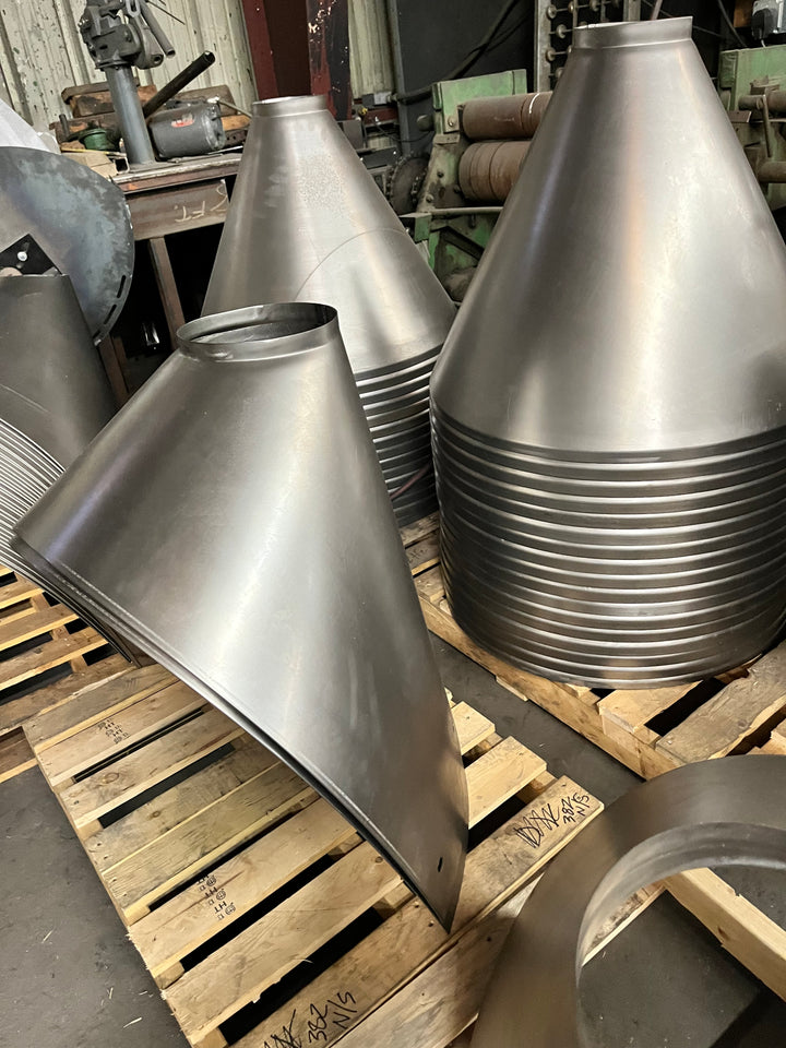 The Cone Shape covers before being assembled in the raw steel and Stainless Steel