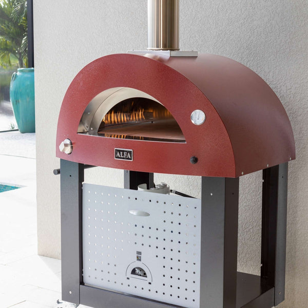 Alfa Moderno 2pizze in Brick Red with the stand and Hybrid kit - they also make a Low and slow kit for these pizza ovens. Holds two pizzas easily Outdoor Wood Pizza cooking with Italian Flair. This the Alfa Ciao on top the the large prep table. The True Italian pizza oven the Alfa Forno Ciao is a wood fired pizza oven for the backyard pizza enthusiast. This pizza oven you can add the cart, legs or just use your own backyard table. the base does not get too hot to be put on wood. Gozney Ooni Pizza Oven