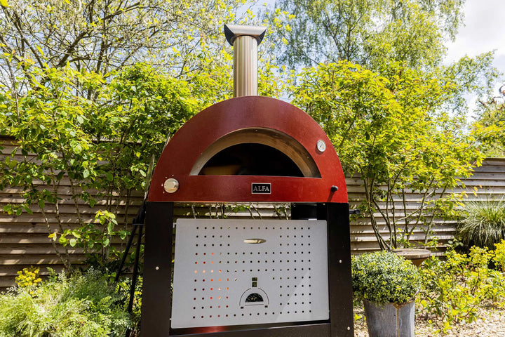 outdoor cooking with you Italian made Pizza oven- this oven will hold 3 pizzas and cook them in under 5 minutes. heating up to 1000 degrees easily