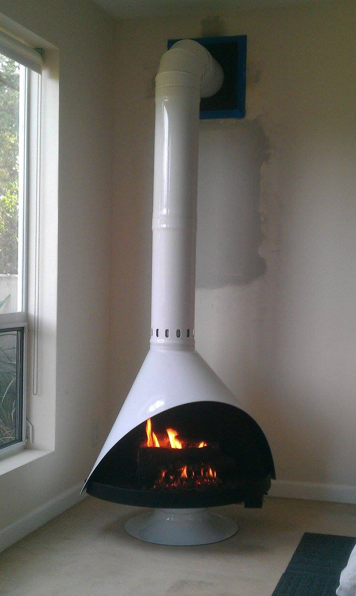 Malm Zircon White with White Matching Base and 90 degree Elbow for the Chimney Flue Pipe on thie Mid Century Modern Cone Fireplace by MALM The Zircon high Sierras Fireplace is  scandinavian style