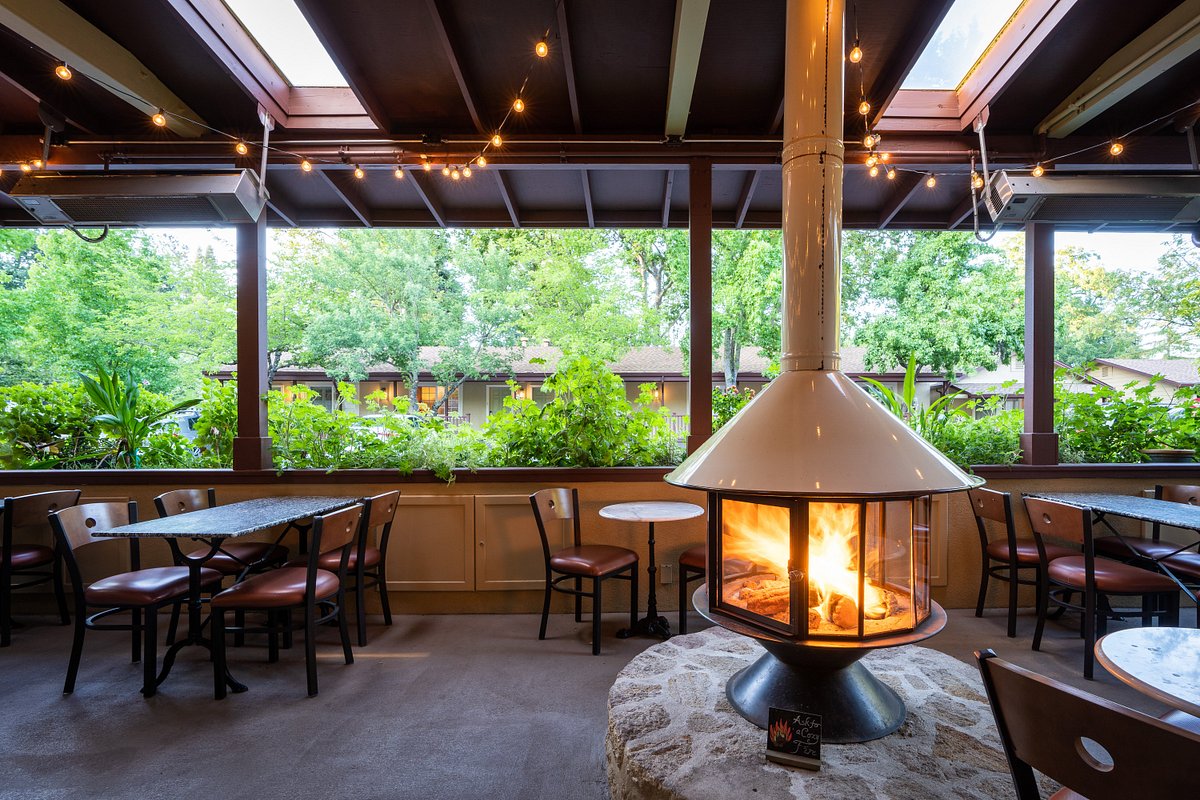 White Malm Carousel fireplace- perfect fireplace for the designer of a nice restaurant 