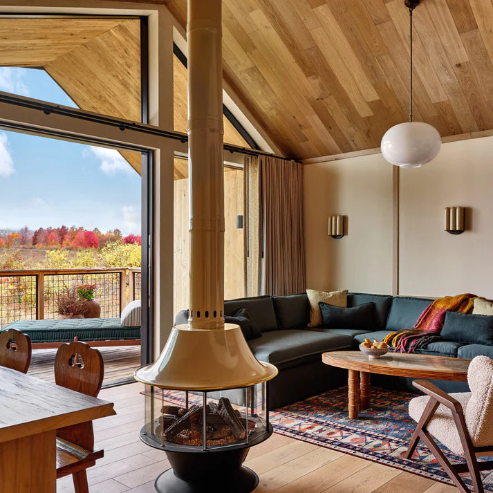 Mid Century Modern Fireplae with a 360 angle viewing area. This is the Spin a Fire by Malm- Very Similar to the Carousel by malm. Malm is the original MCM Maker and is still in business in California. They creaked the Malm Zircon Cone Fireplace that is still a very popular fireplace 
