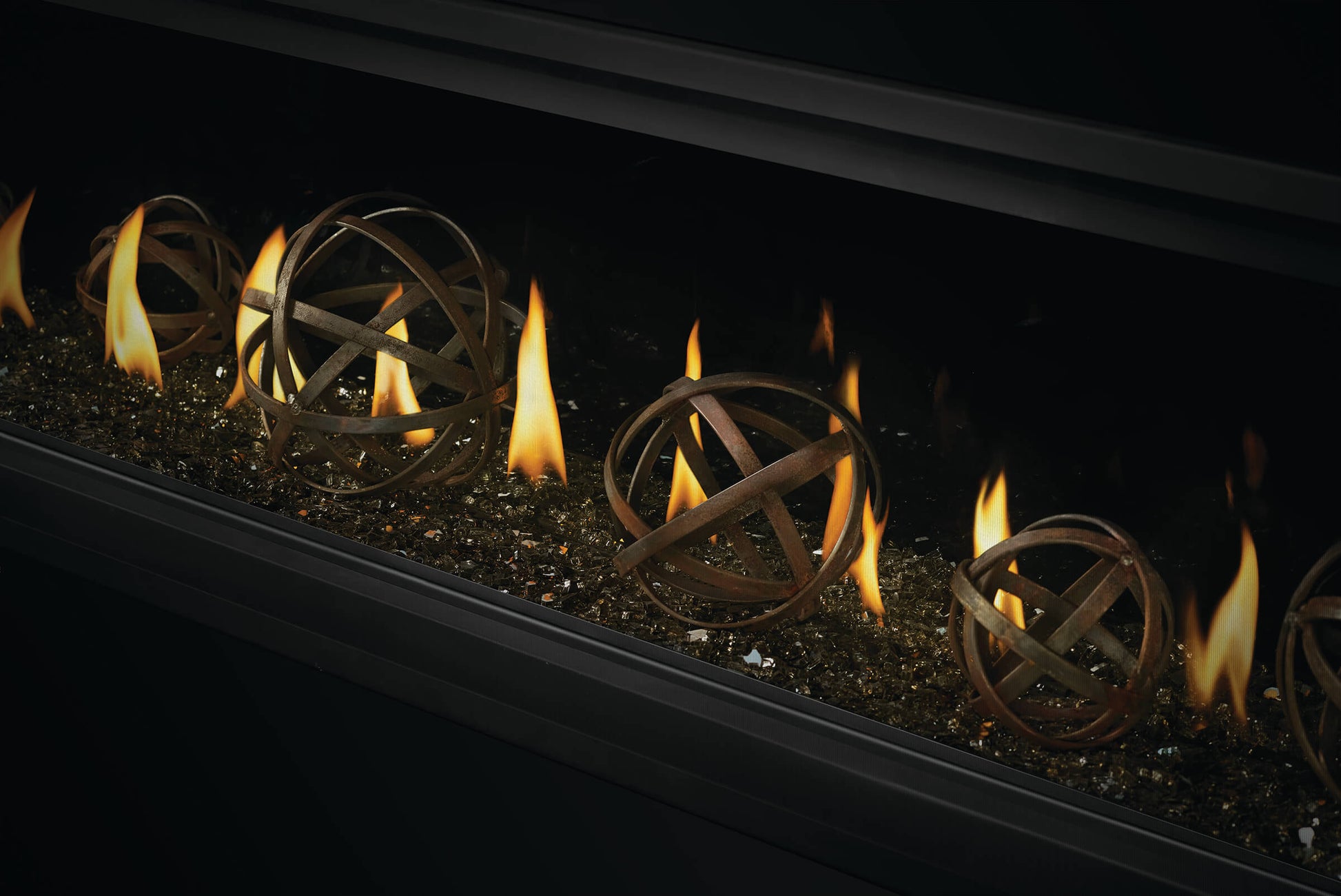 Napoleon's Luxuria 74 See-Through linear gas fireplace provides an unobstructed view of the contemporary linear fire and requires no safety screen. The safe-to-touch, triple-pane Glass Guard system, and Dynamic Heat Control provide safe heating and beautiful views to two rooms at once. Versatile installation opportunities allow for TVs and artwork to safely be displayed above the fireplace while combustible materials are installed flush with the opening. Include premium media options like Nickel Stix, Miner