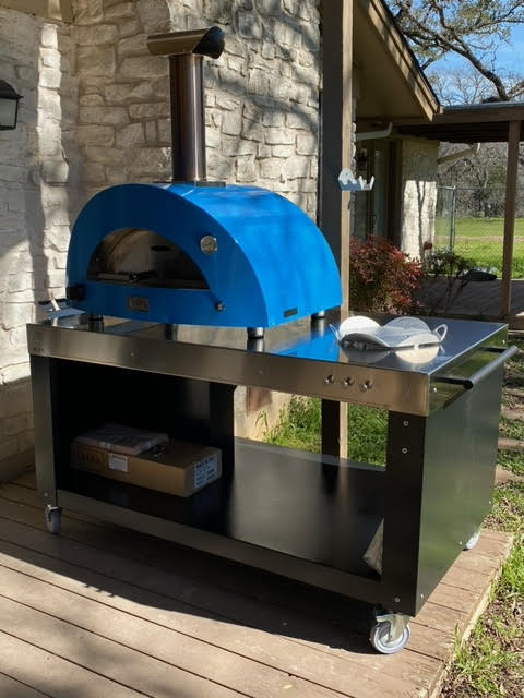 The Limited Edition Alfa 2 Pizze on top of the 60" prep table by Alfa with the Tool Kit by alfa - Our Customer Brad Proudly displaying this in his beautiful back patio