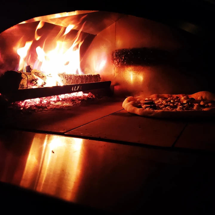 3 Pizze using the Hybrid Kit cooking wood fired pizza. 