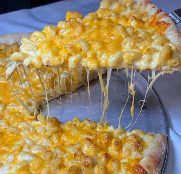 Mac And Cheese Pizza a personal favorite in the mid west specifically Madison Wisconsin. Pro Tip add a touch of BBQ Sauce on top