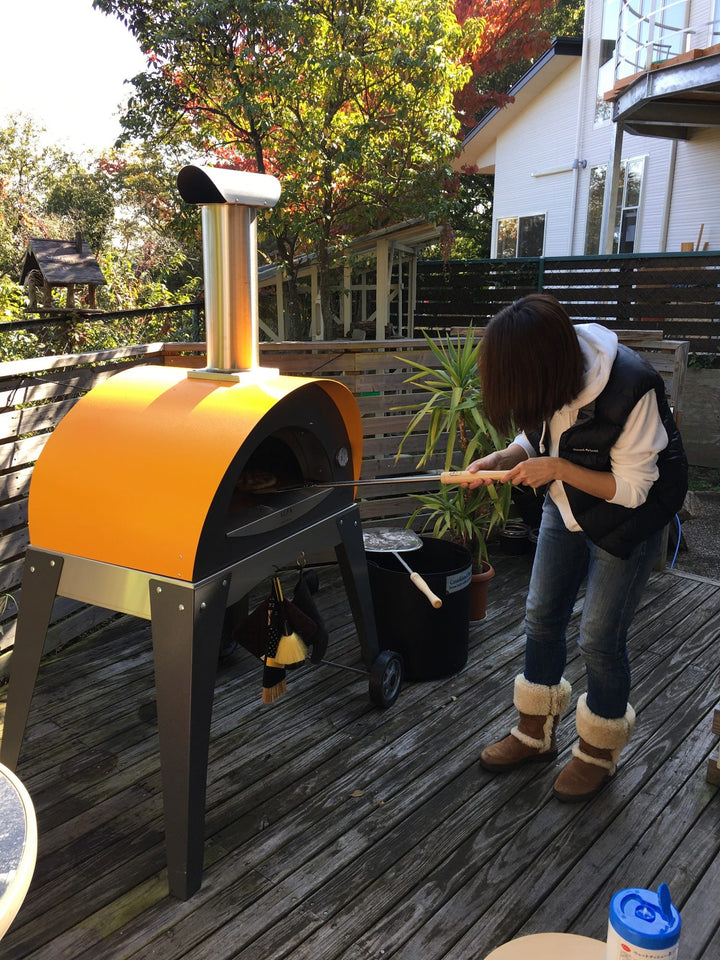 The Yellow outdoor Pizza oven can be used by just about anyone with the true Italian flavor 